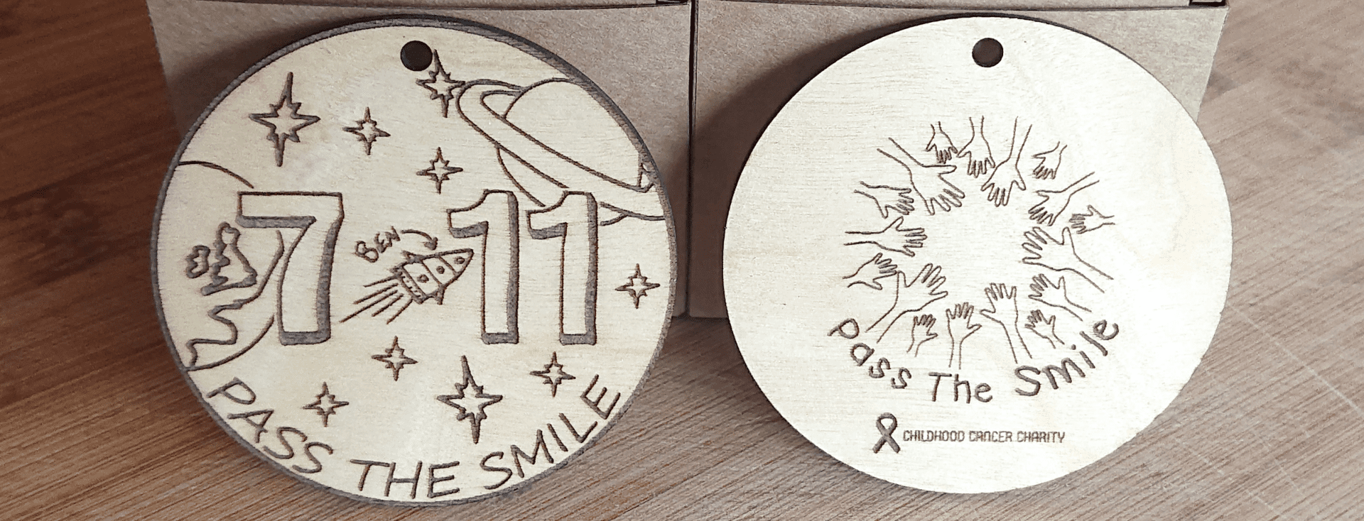 Wooden charity medals cropped