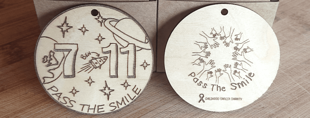Wooden charity medals cropped