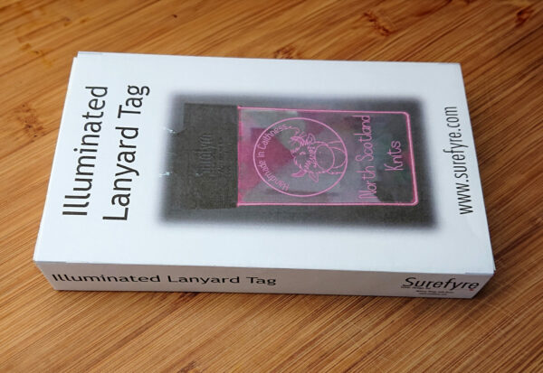 Illuminated lanyard tag box